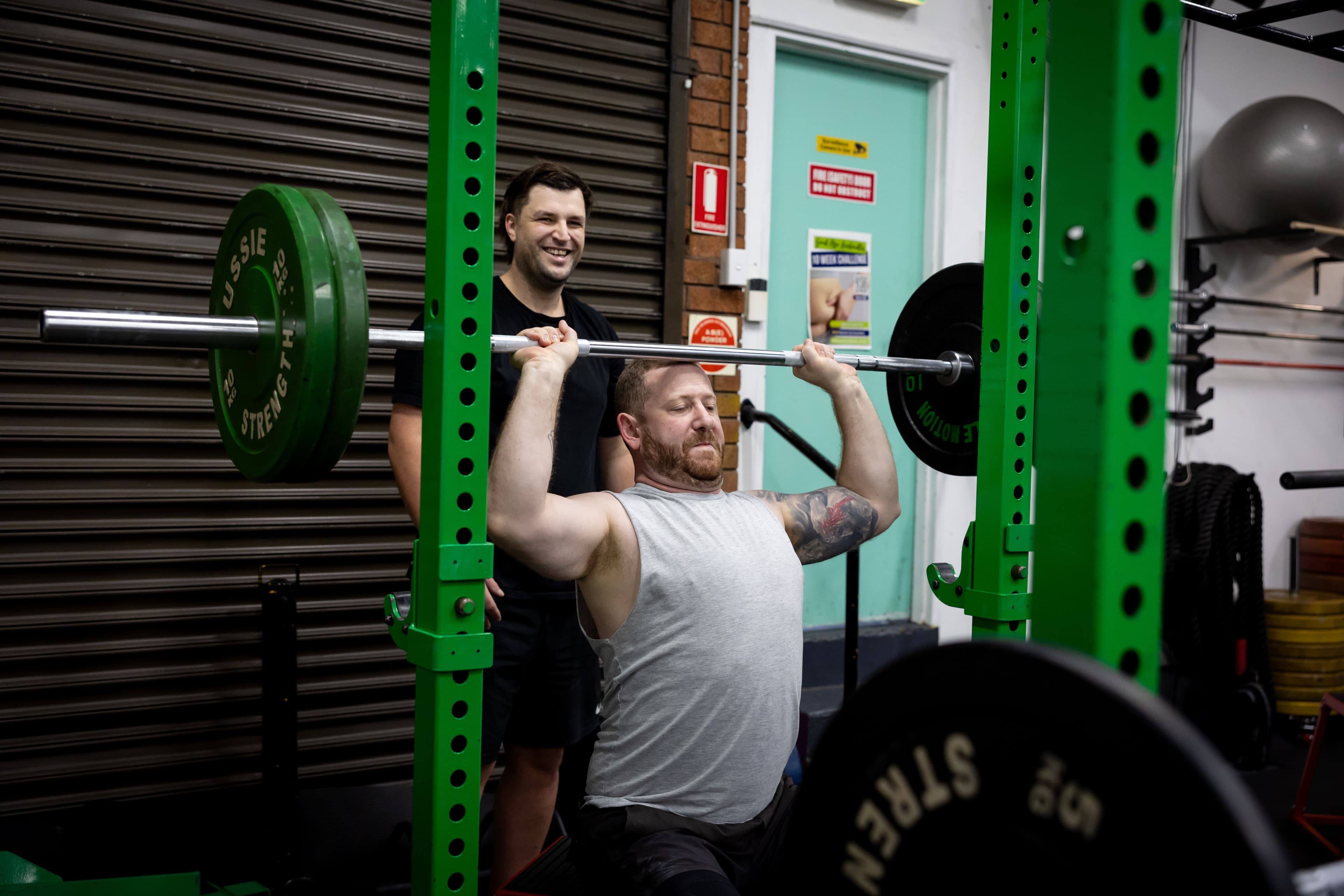 men lifting weights