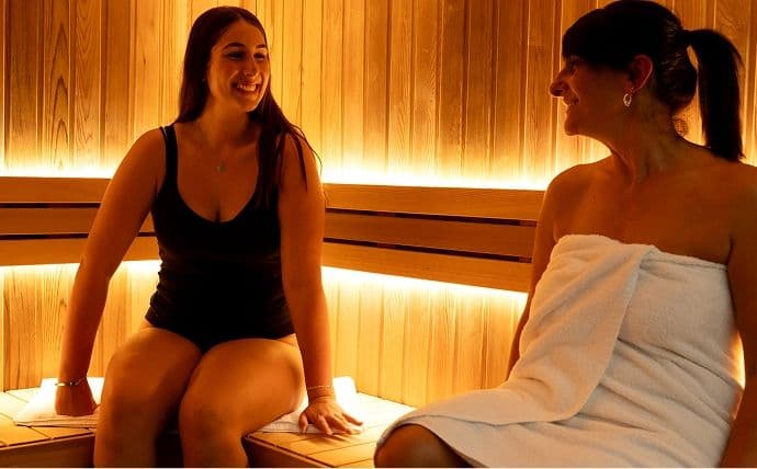 Oasis Room - People Enjoying Sauna