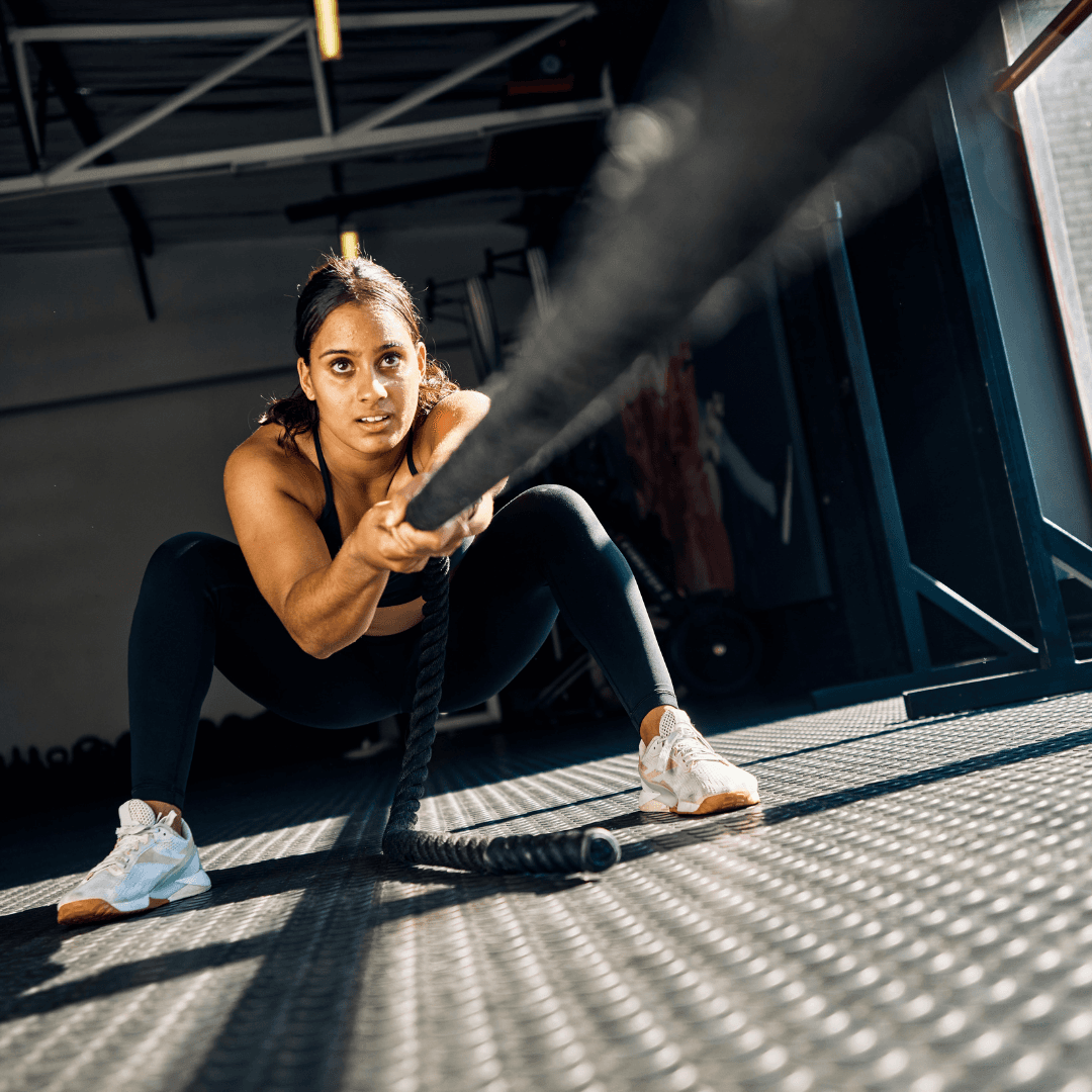 A picture of a woman doing hyrox
