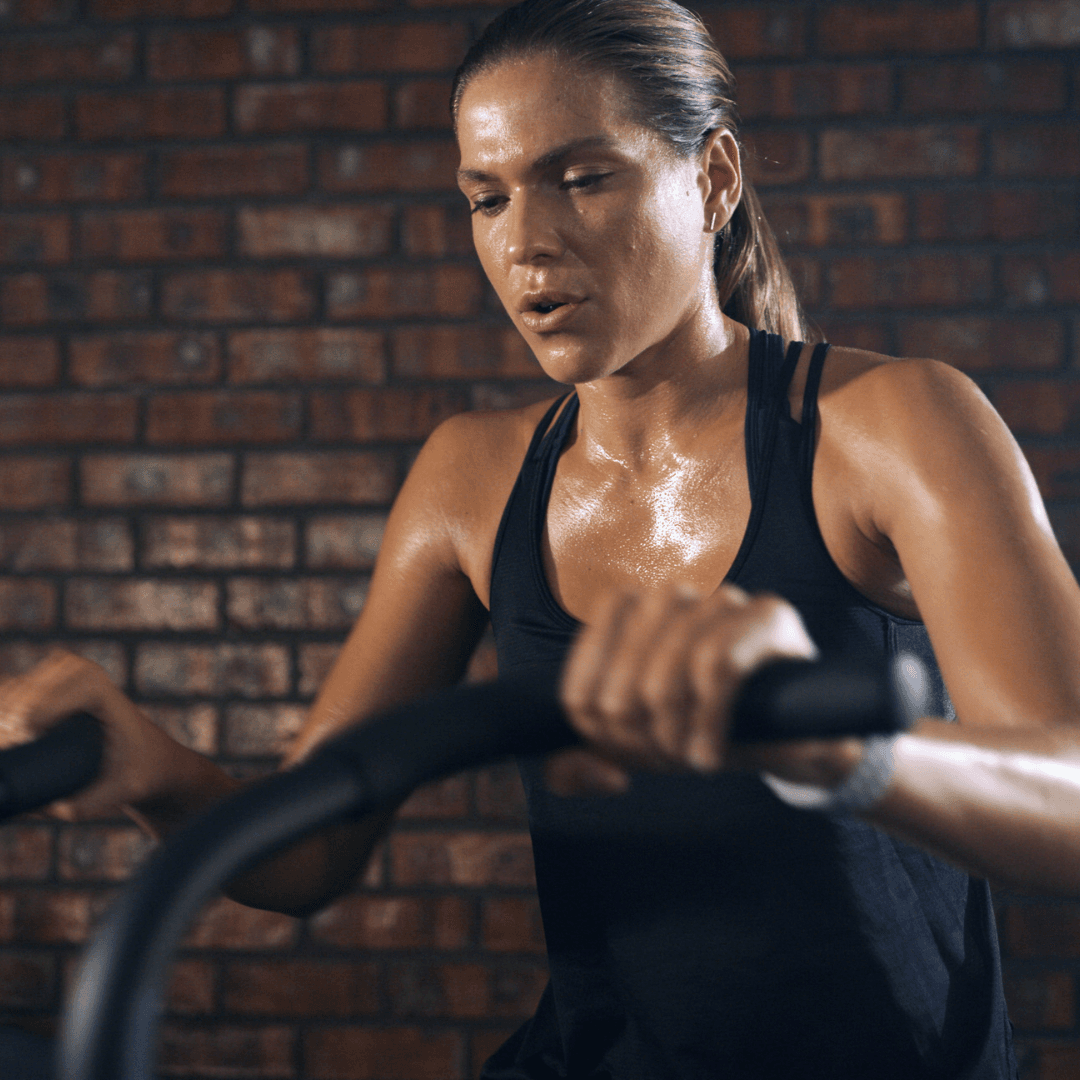 a woman on an exercise bike at InnerFit